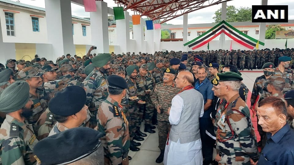 Defence Minister Rajnath Singh interacts with Army and Assam Rifles personnel in Imphal