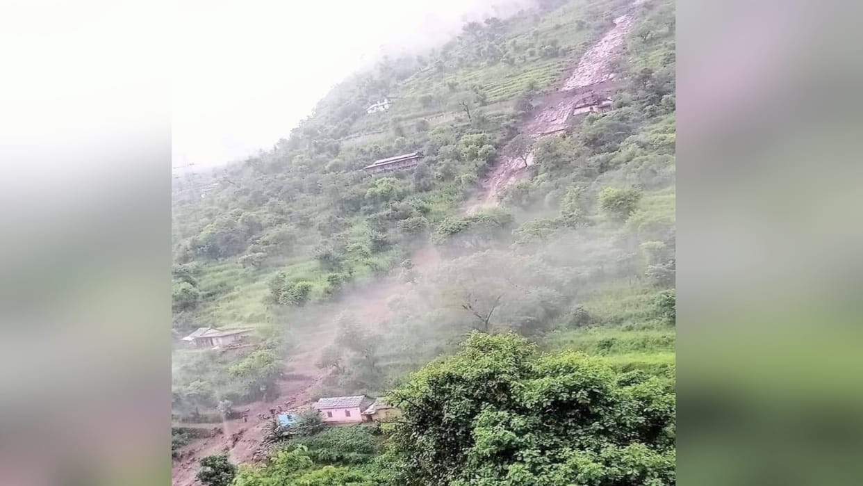 Two bike riders died after being hit by boulders that fell from the hill