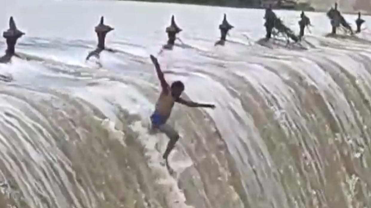 Policeman and a child were washed away in the water due to the river drain being in spate