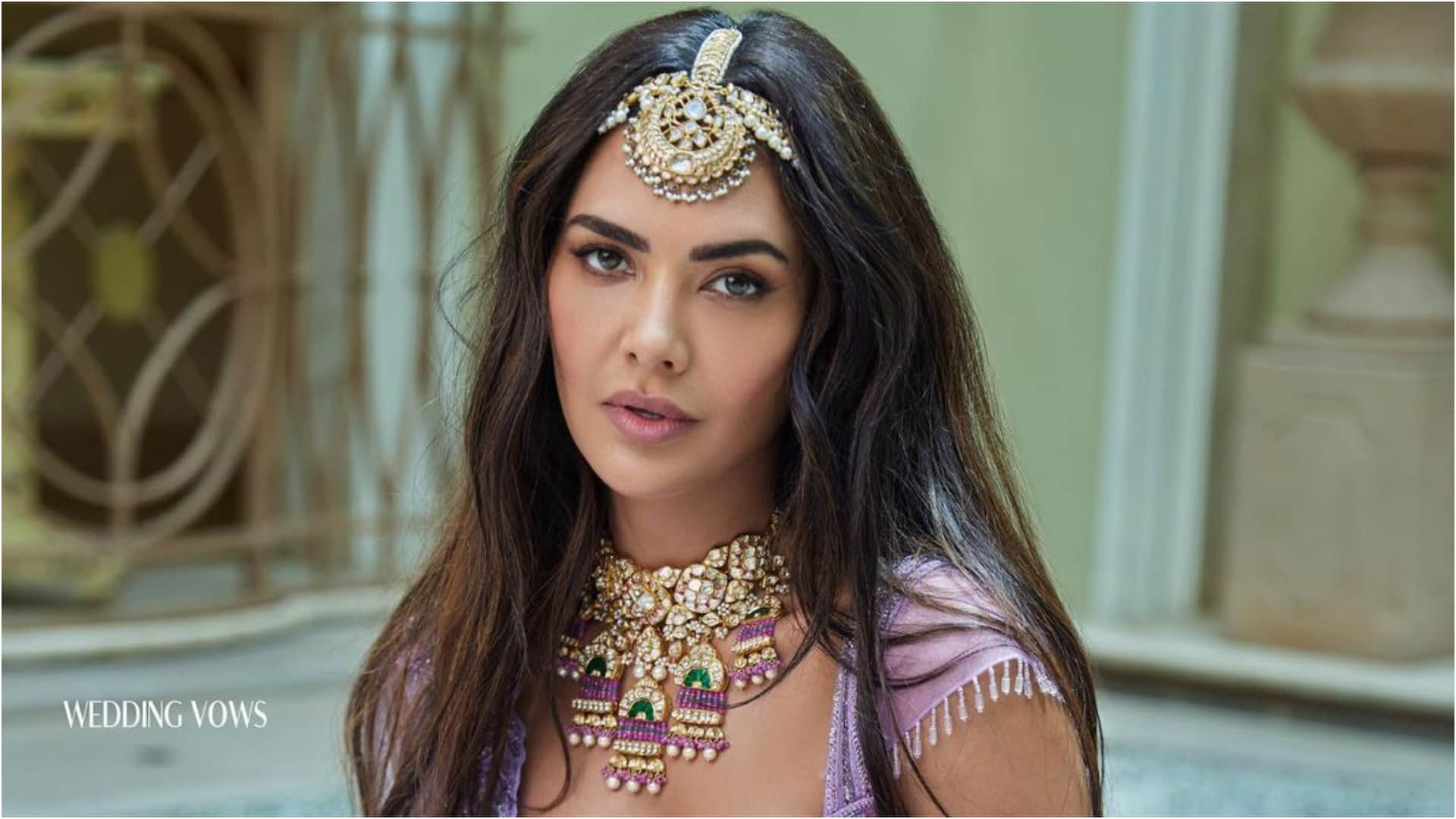 esha gupta became modern bride in lavender lehenga with bold neckline blouse