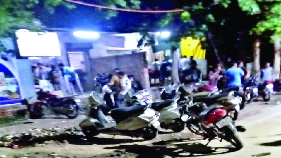 men drinking wine and beer in public places in Dayalbagh Agra