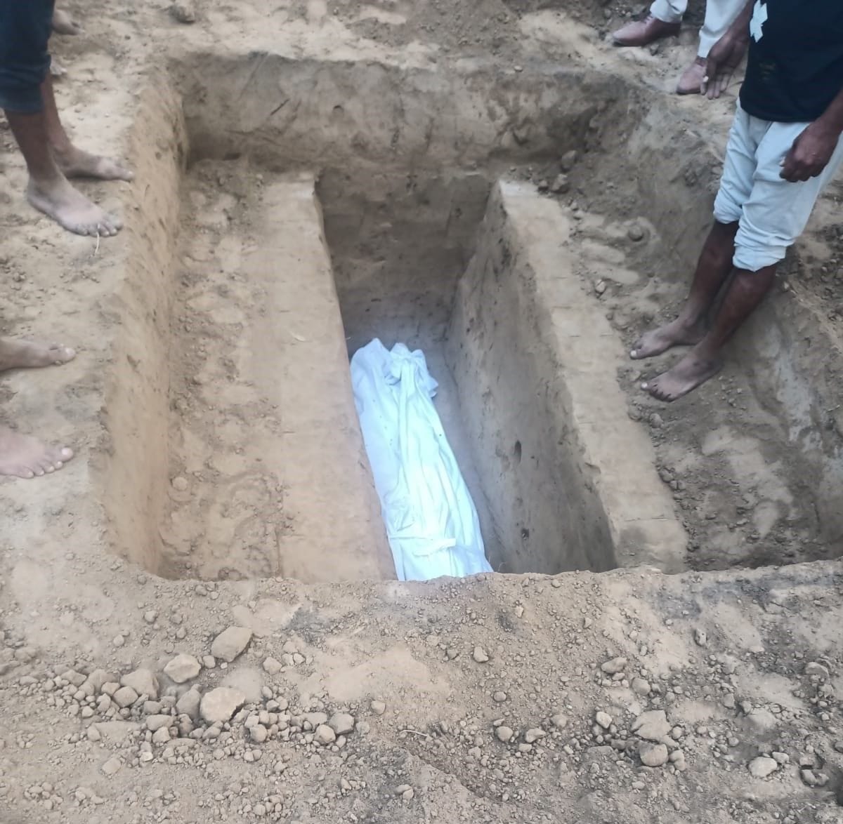 After the death of the person under suspicious circumstances, the family members buried him.