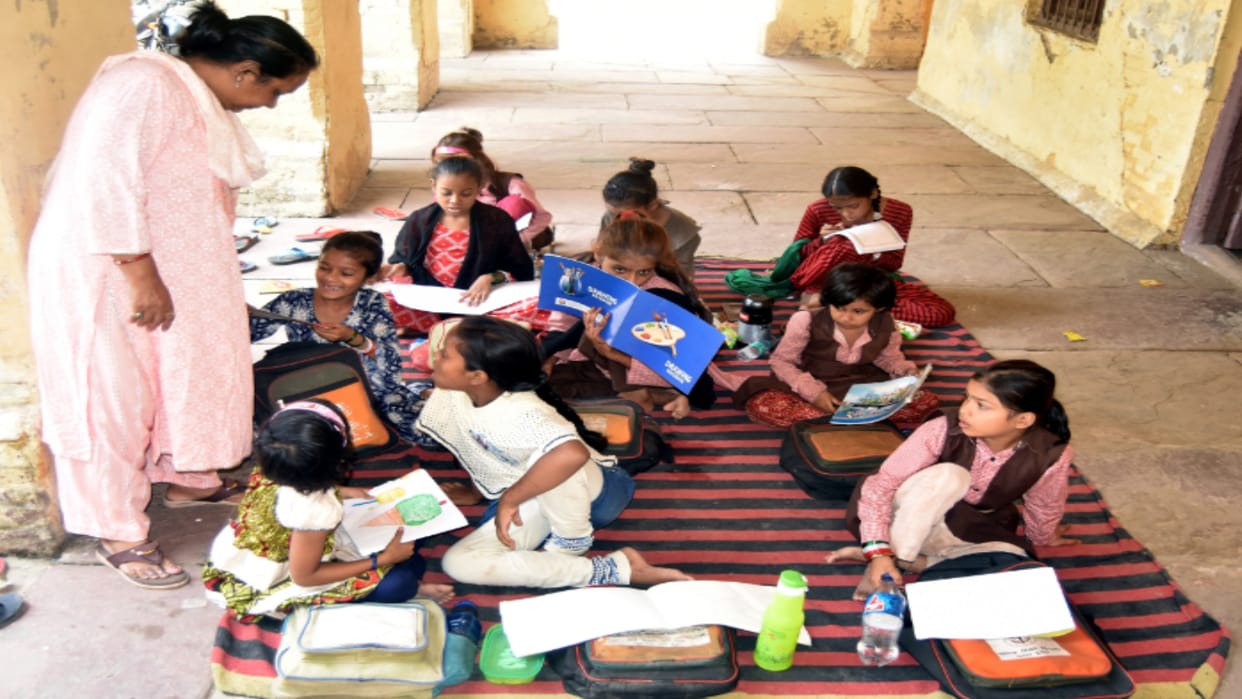 Empty bag, no books, kids are studying with incomplete course even after half of the session