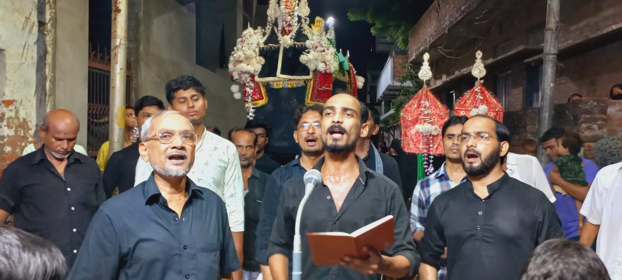 Procession of coffin and alam in memory of Imam Sajjad