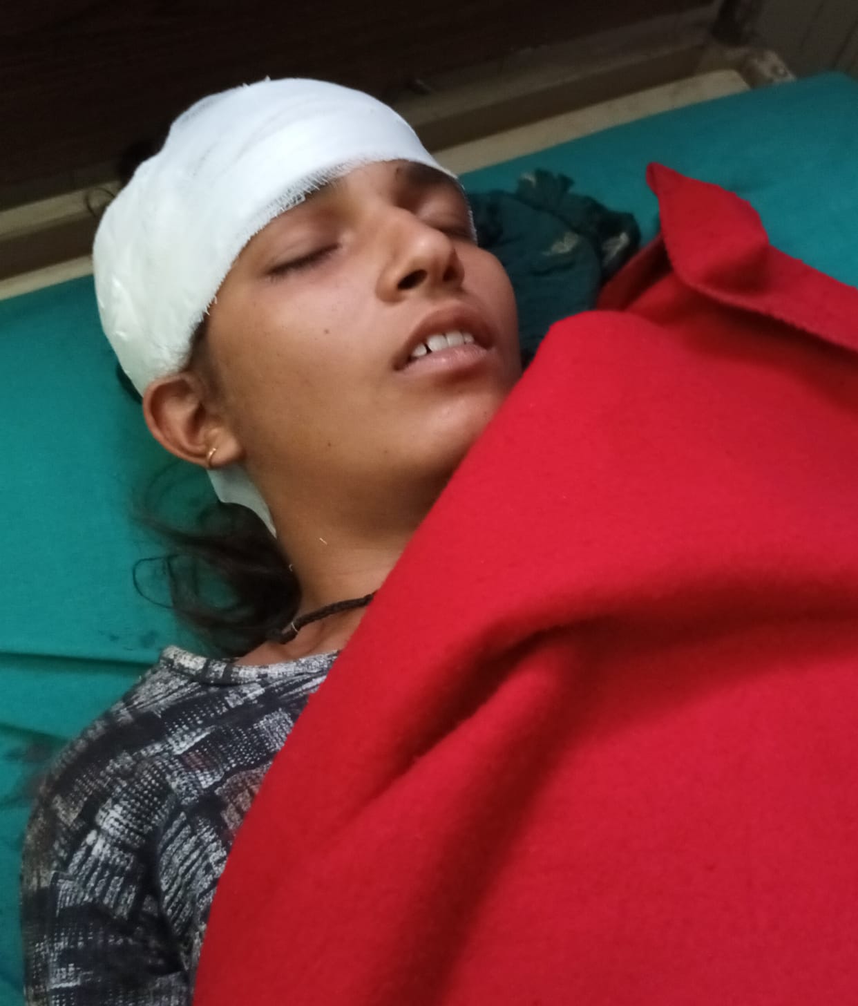 Two girls crossing the highway injured in a tempo collision