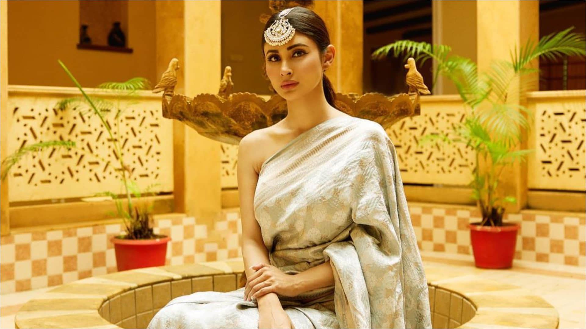 mouni roy poses in silk saree ditch blouse for sizzling look