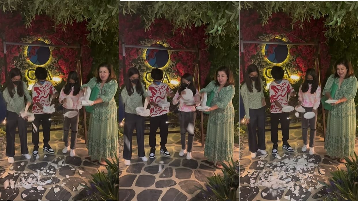 farah khan breaks plates with kids following a greek tradition users says total waste of money