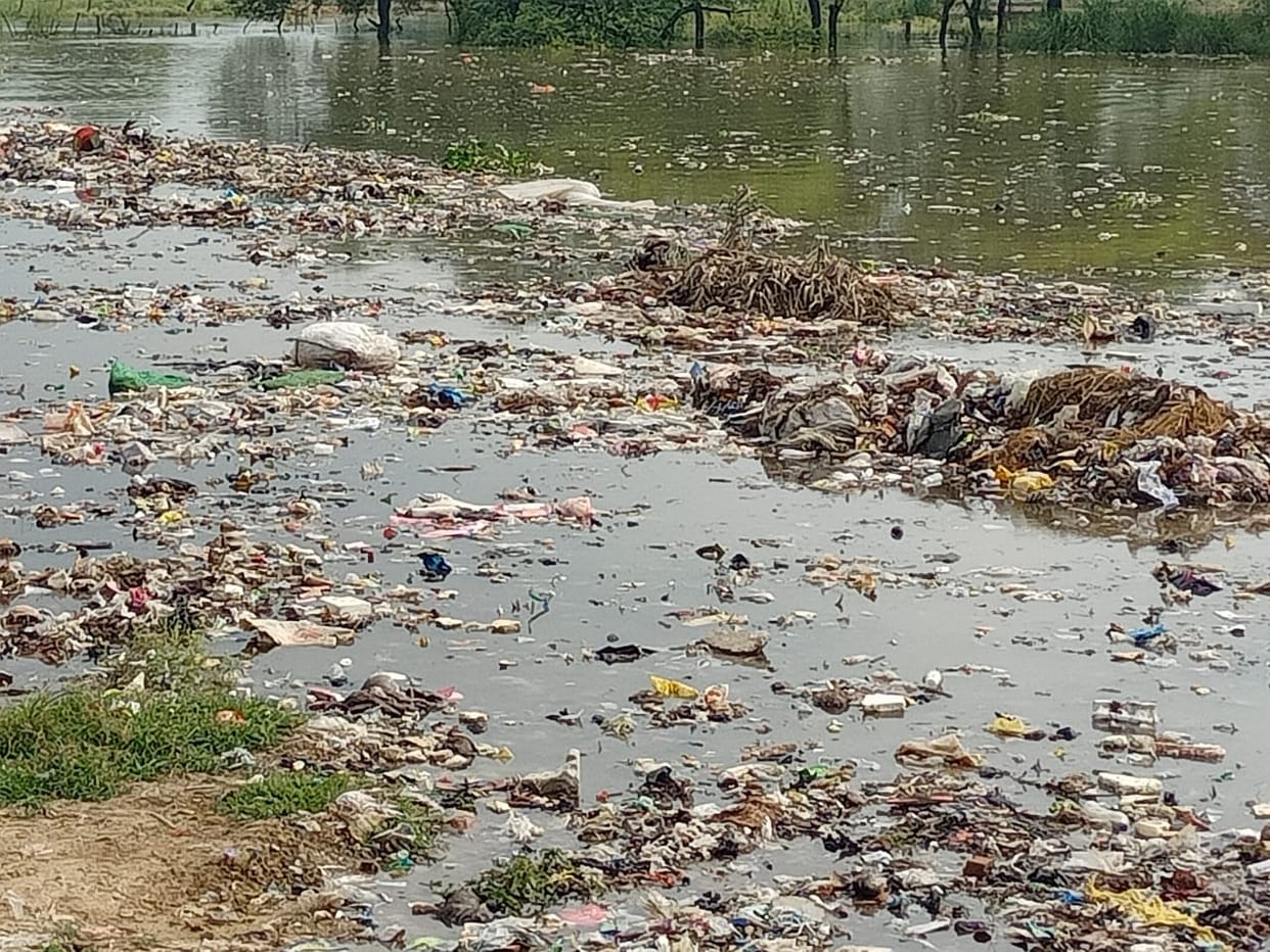 The municipality was involved in planning and the garbage washed away in the flood