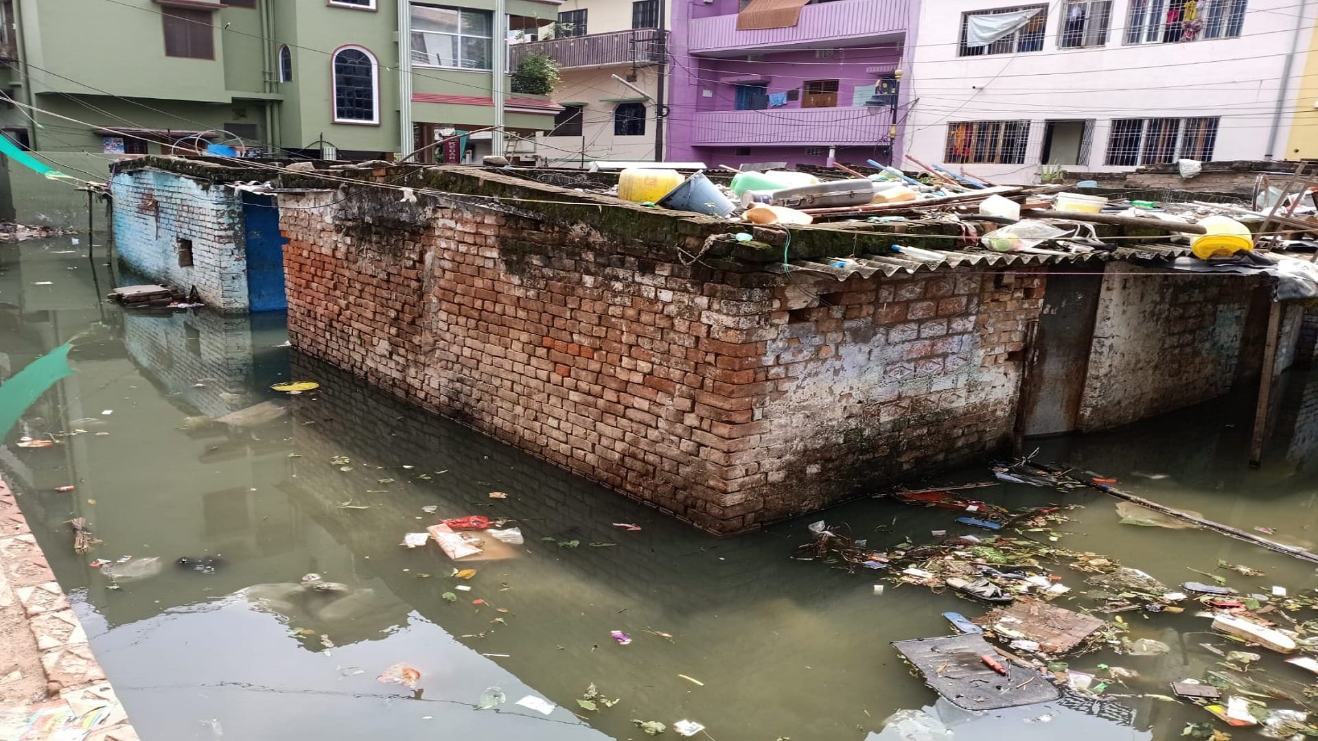 flood in Kashi in pictures: House ghats and temples submerged boats are on the road