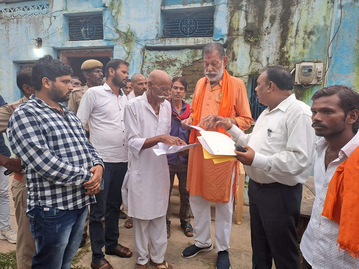 Minister of State handed over the check to the families of the deceased girls