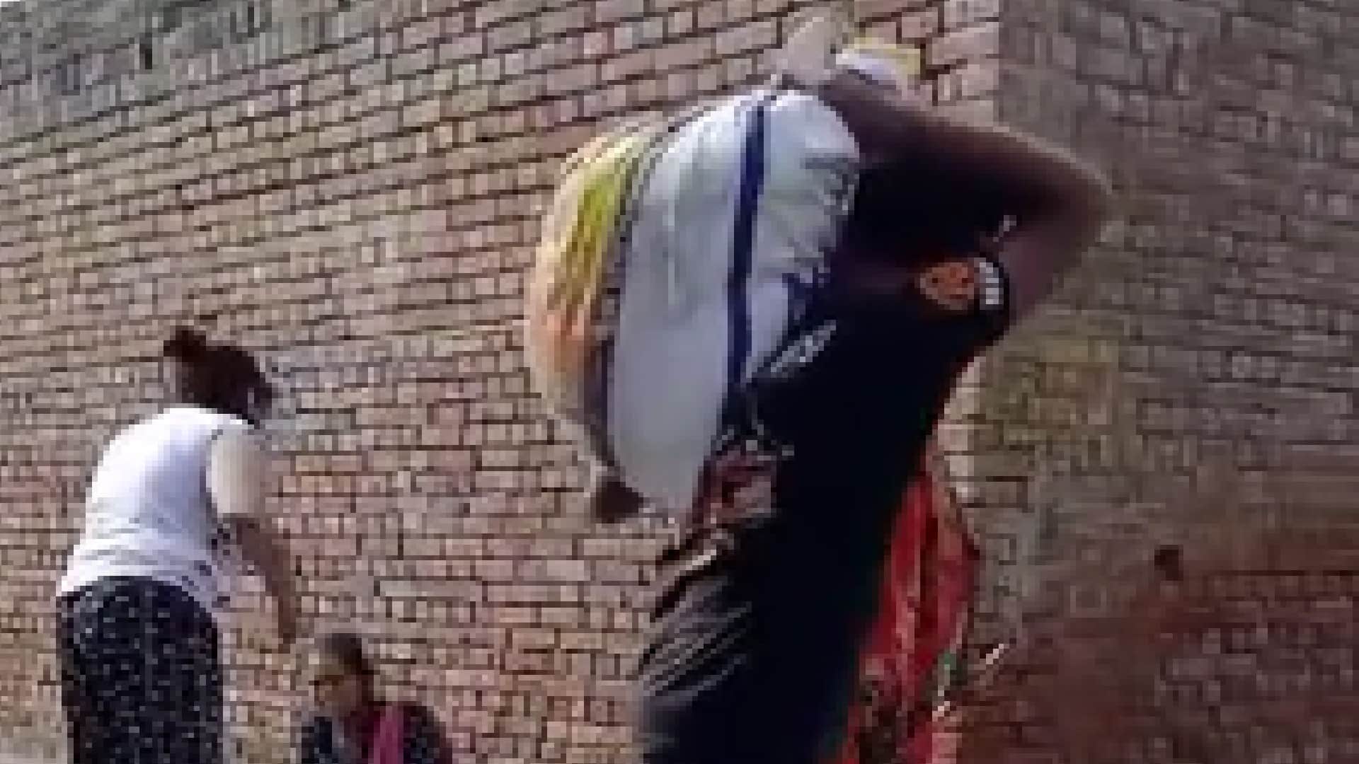 mother and daughter beat girl on road abused her and filled her mouth with mud In Sambhal