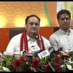 अगरतला में प्रेस कॉन्फ्रेंस को संबोधित करते जेपी नड्डा