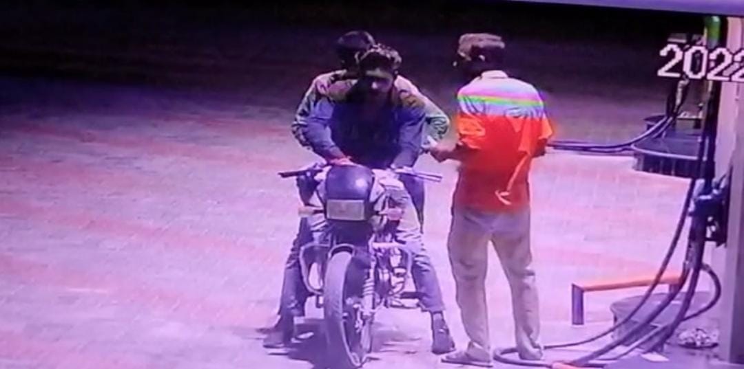 First put oil in bike, asked for money, then escaped by showing pistol