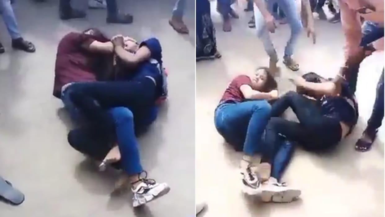 Two girl students clashed on the road as soon as they came out of coaching, kicked and punched each other
