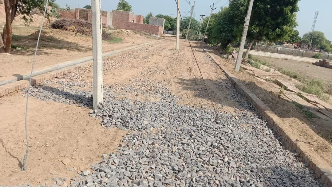 Construction of the street started without removing the electric poles in Kanwarpura