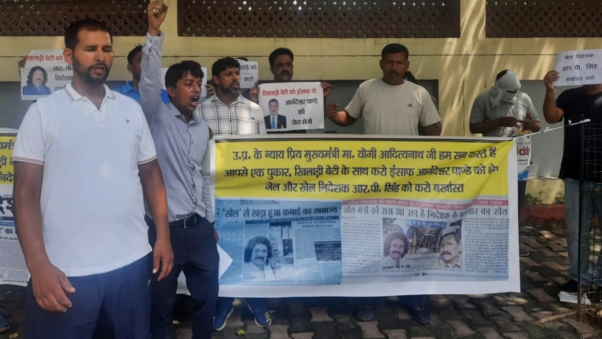 Protest against UP Olympic Association Mahasachiv Anandeshwar pandey.