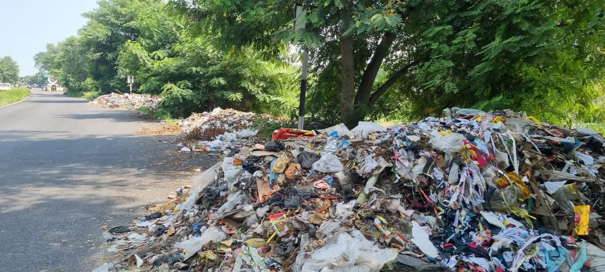 City garbage being dumped along the highway