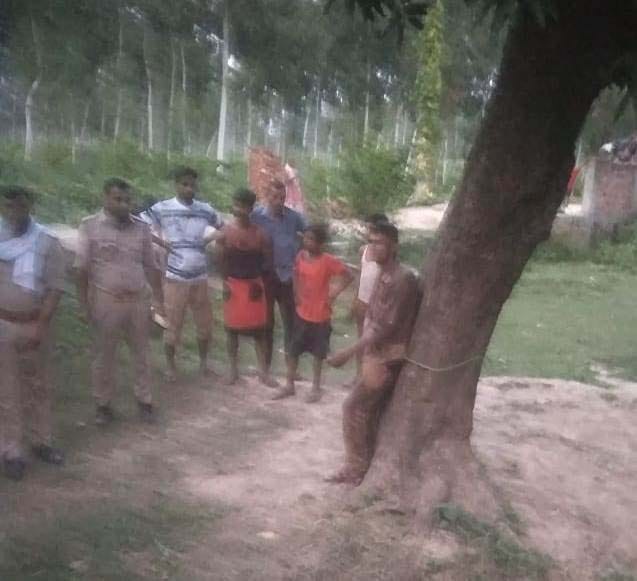 Villagers tied the young man to a tree as a thief