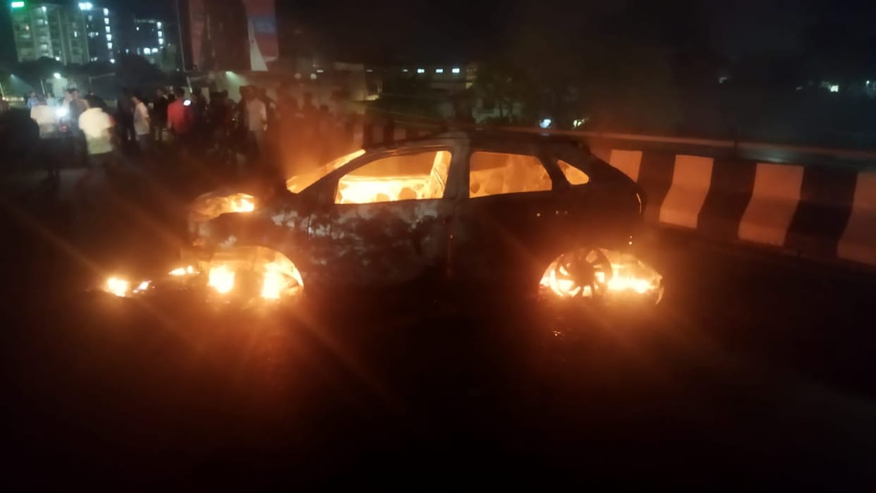overspeed car caught fire in varanasi at tarna rob