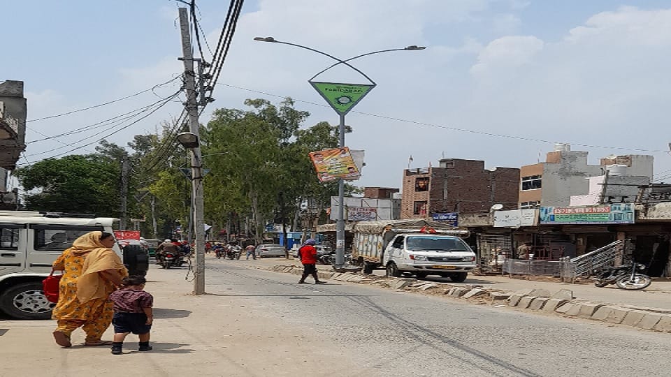 smart City Limited built a road without removing electric poles from middle of road on Patel Chowk-Bakharal Ro