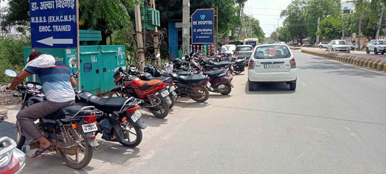 There is no parking system in the city, where the vehicles parked cause jams