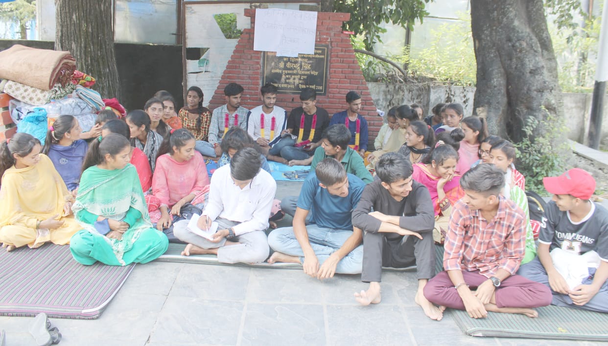 Students sitting on a gradual fast leaving studies