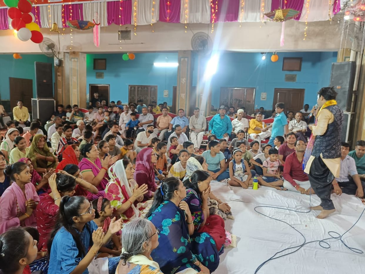 Offering laddus by worshiping Ganpati