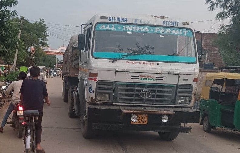 Overloaded vehicles demolishing the road to save toll