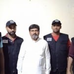 एसटीएफ बहादुरगढ़ की हिरासत में आरोपी नरेंद्र चौधरी।