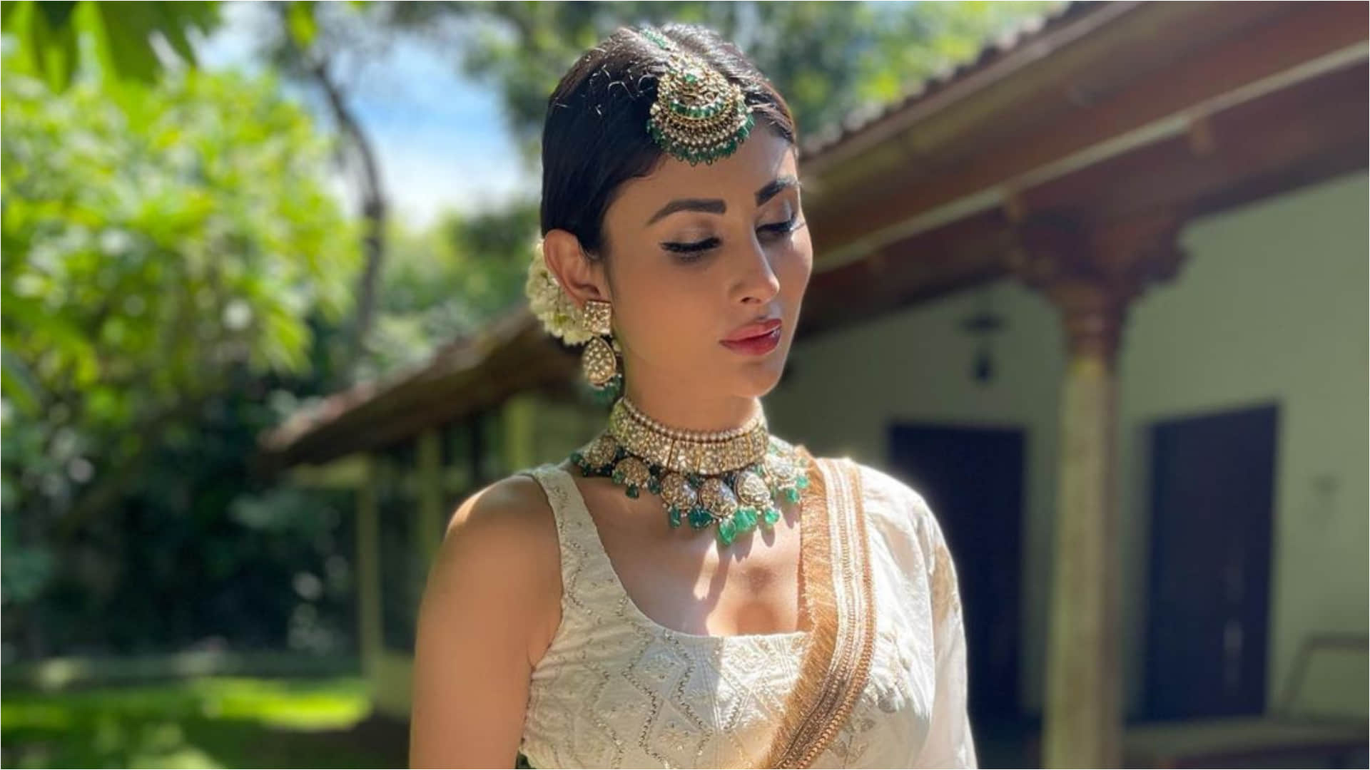 mouni roy twirling in white lehenga take pics clicked by patidev suraj nambiar