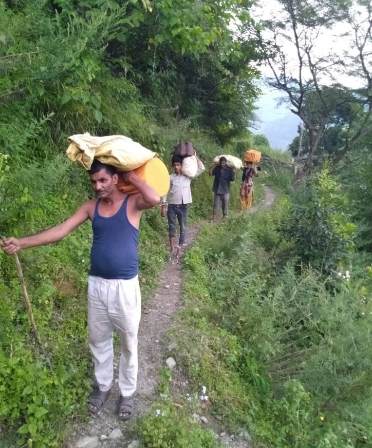 Even today ration material is being carried on the head
