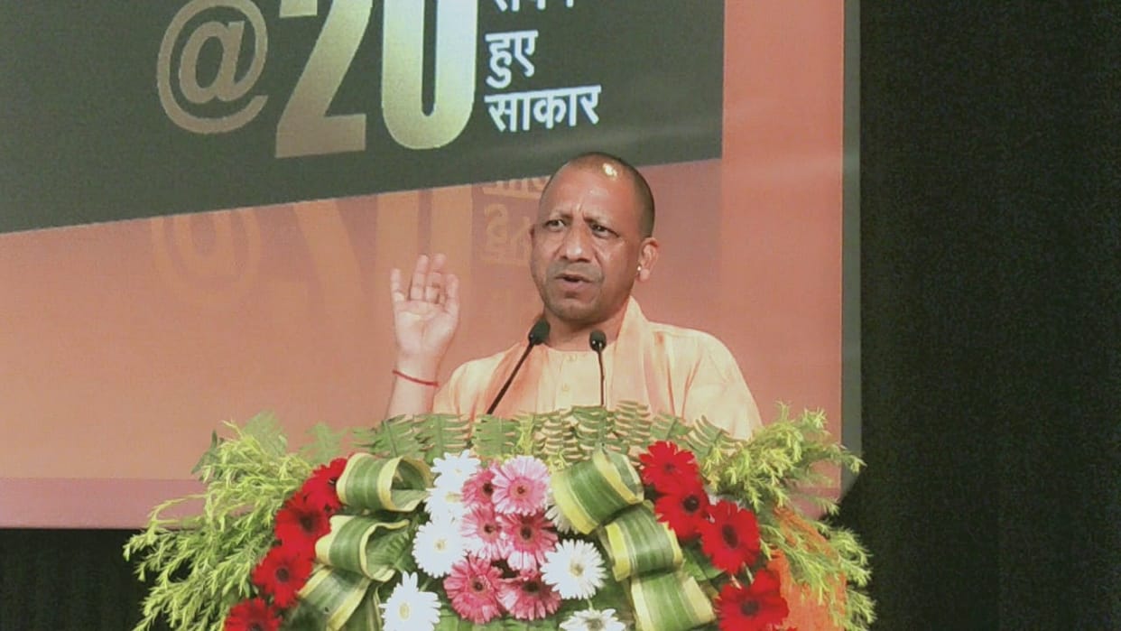 CM Yogi released Modi@20 book in varanasi said modi hai to mumkin hai to enlightened people of Kashi
