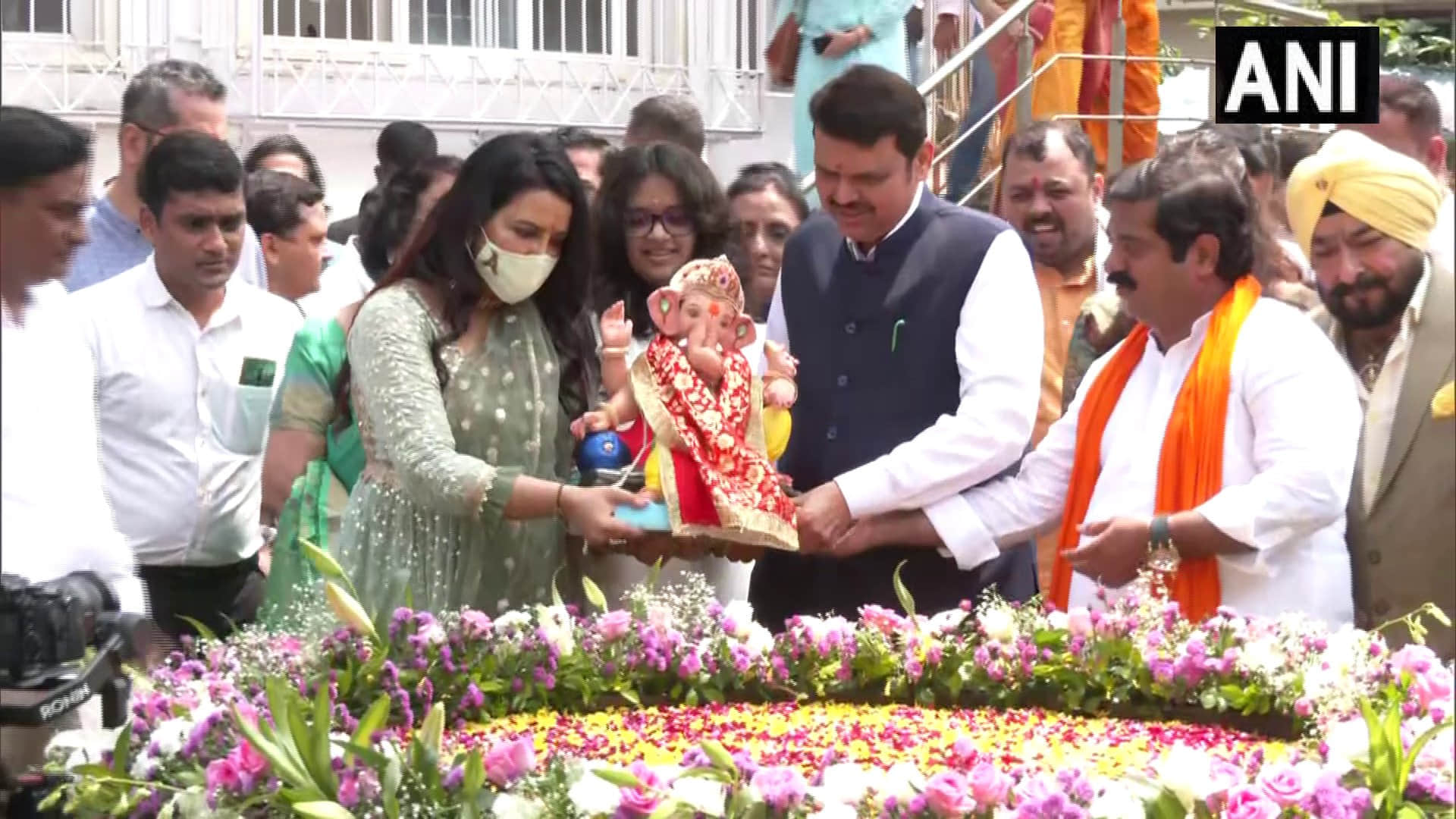 Maharashtra Deputy Chief Minister Devendra Fadnavis immersed Ganesh idol at his residence