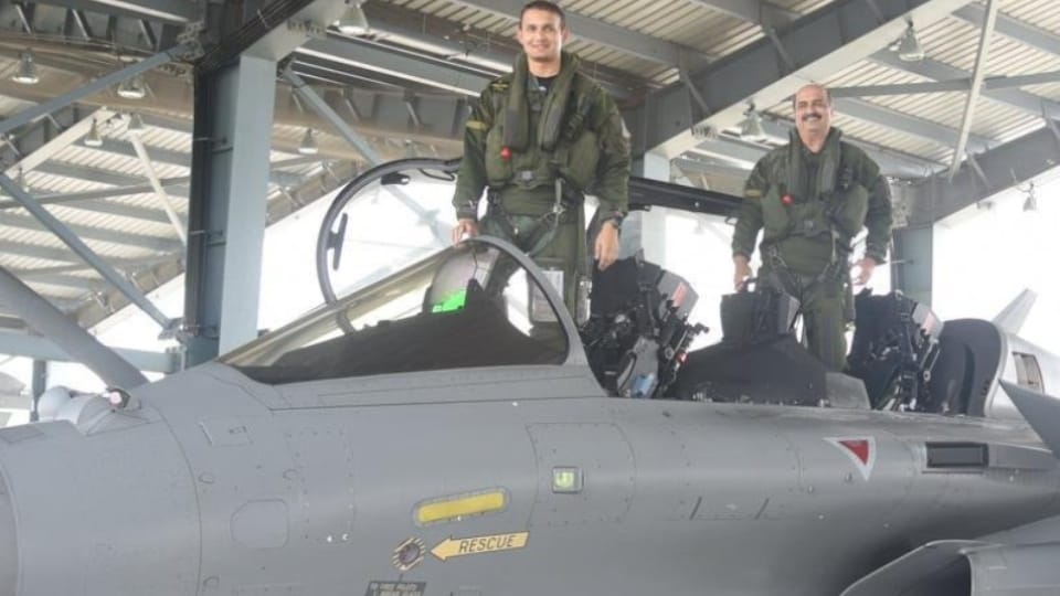 Air Chief Marshal VR Choudhary with his son Squadron Leader Mihir V Choudhary in a Rafale loaded flight