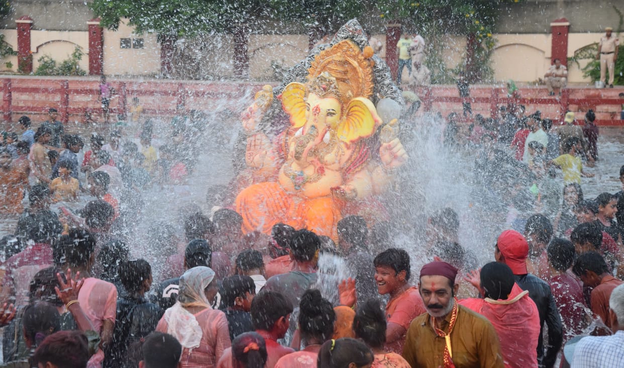 Ganpati Bappa Morya, come early next year... bid farewell with cheers