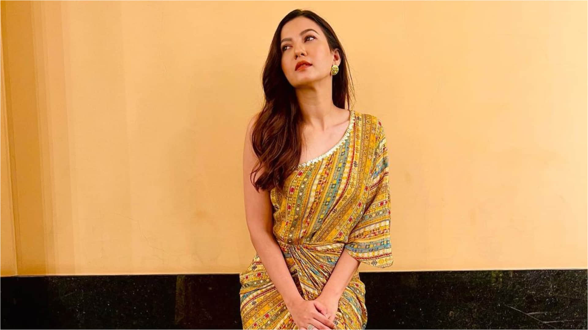 gauhar khan wear thigh high slit yellow printed dress looking gorgeous