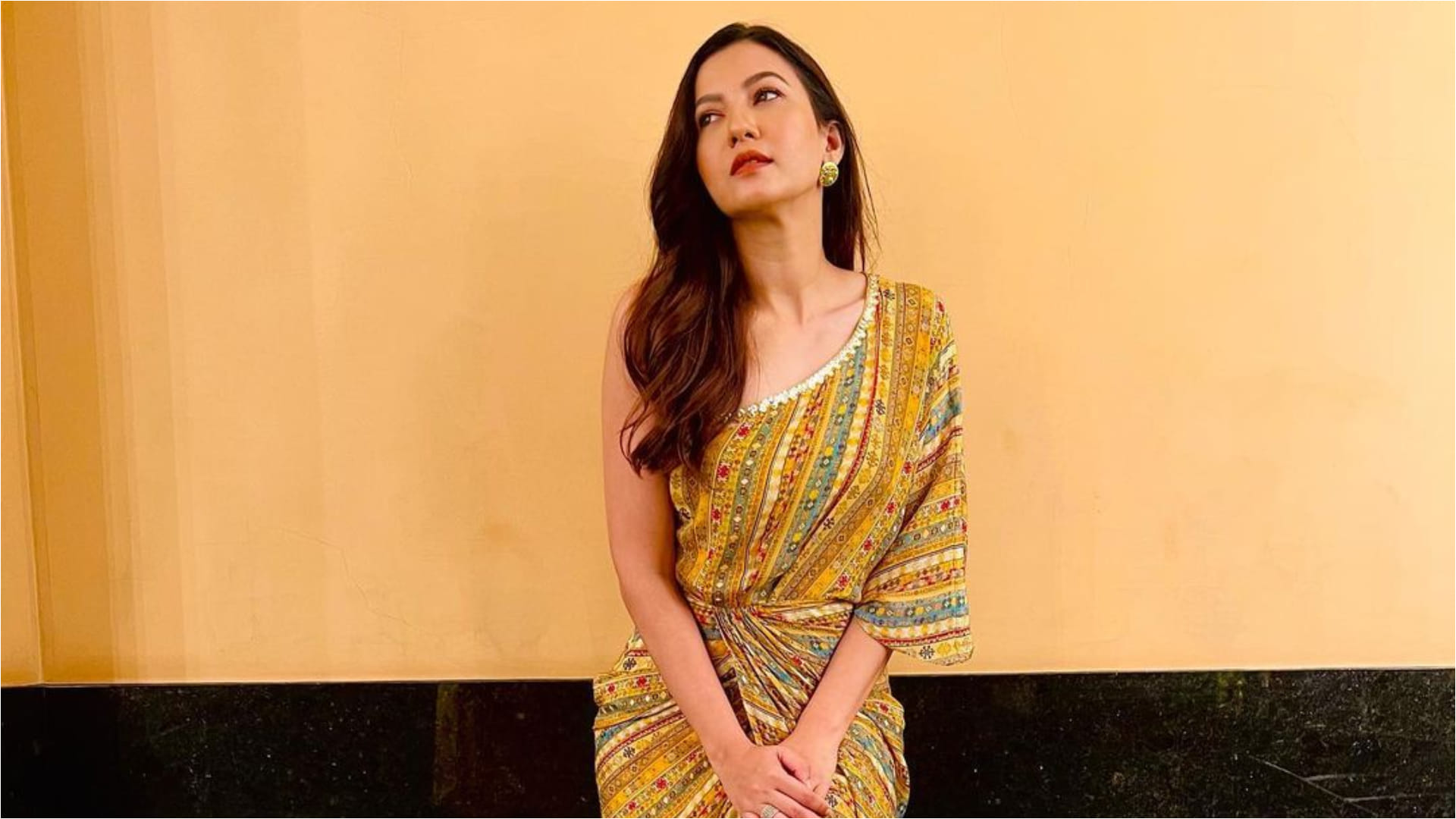 Gauahar khan hides her baby bump at nanad anam birthday party see pregnancy glow on her face