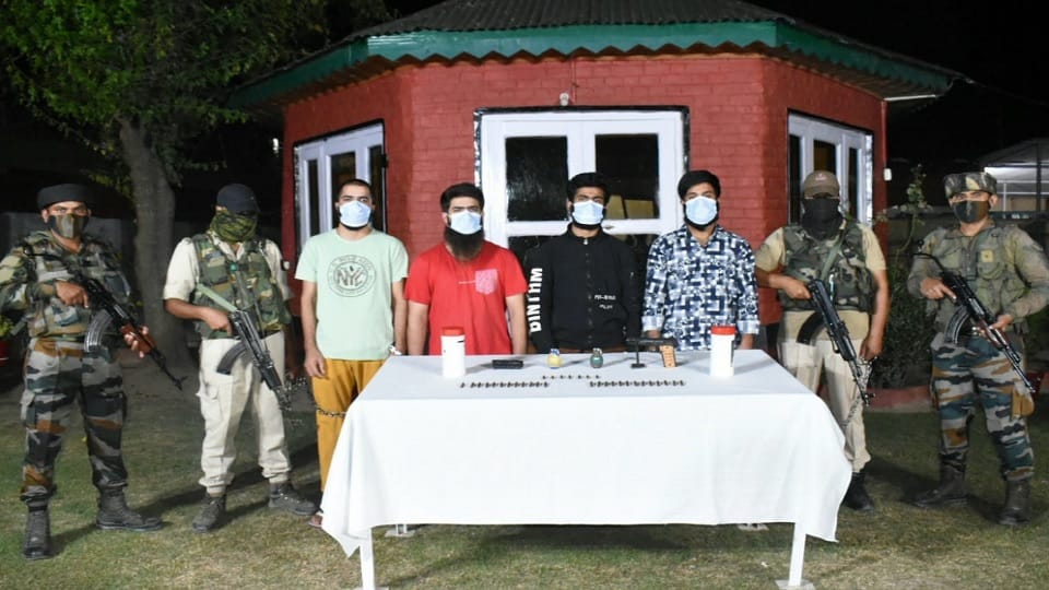 Four OGWs of Lashkar arrested with weapons in Sopore