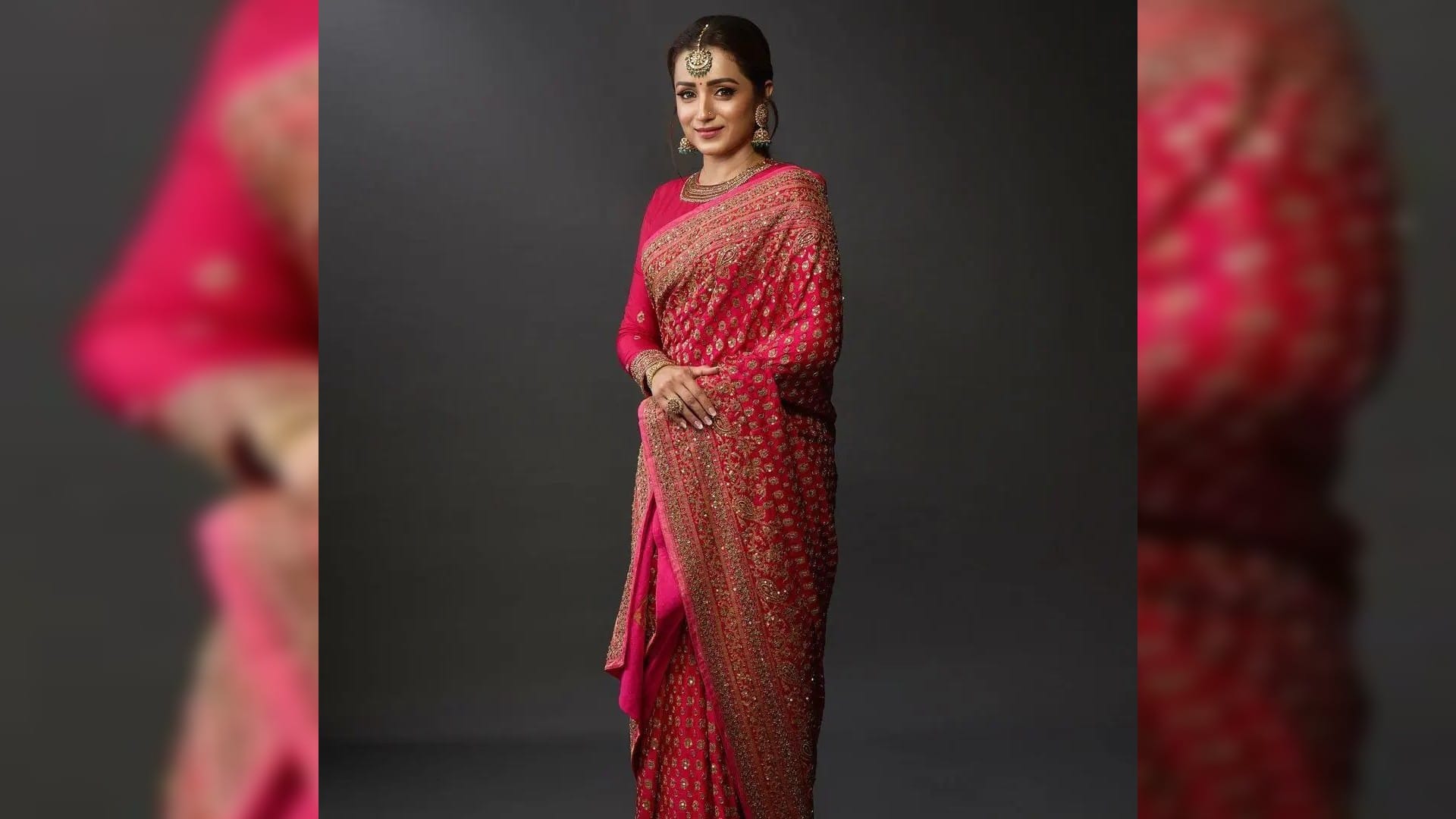 trisha krishnan in bright pink saree with heavy embroidery and maang tikka for movie ponniyin selvan trailer l
