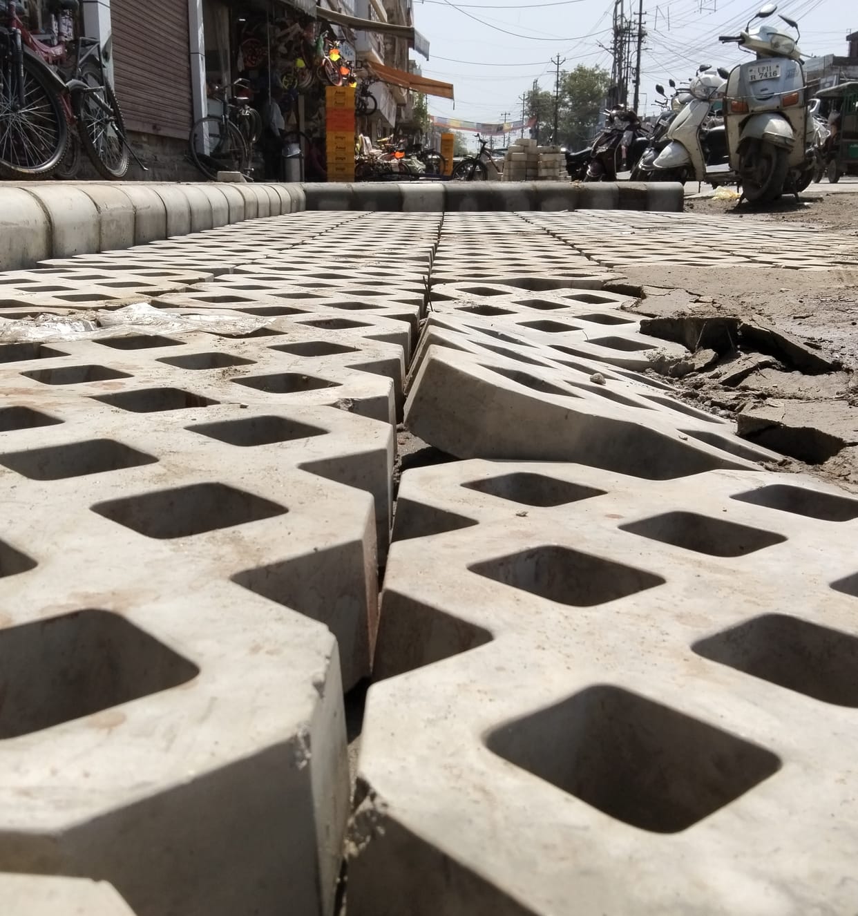 Smart pavement tiles sunk in the very first rain