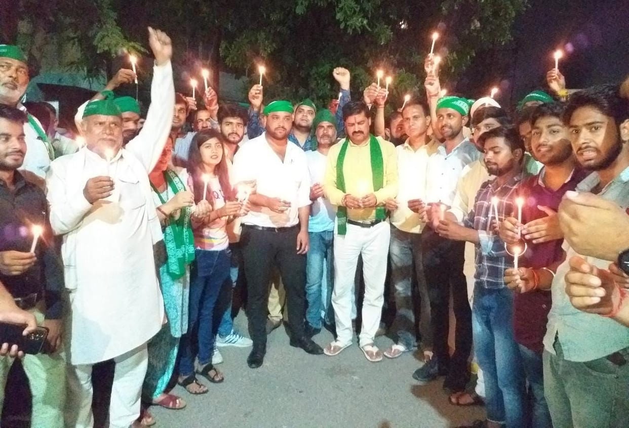 Bhakiyu took out candle march, demanding withdrawal of cases
