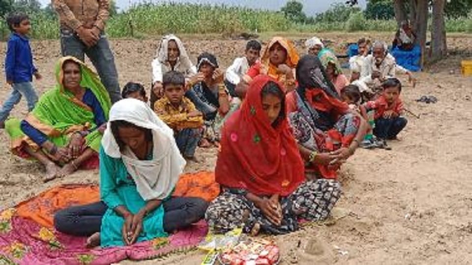 adolescent girls Sitting In Worship Of Indra For Rain In agra