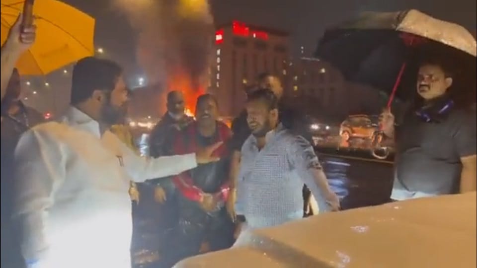 Car catches fire on highway in Mumbai, Maharashtra CM Eknath Shinde stops to help