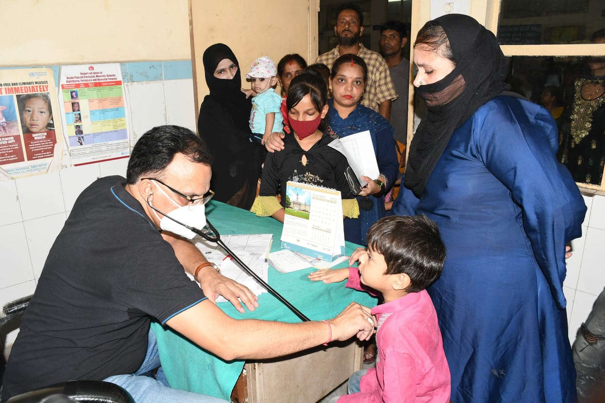 Abdominal pain with fever, complaints of vomiting