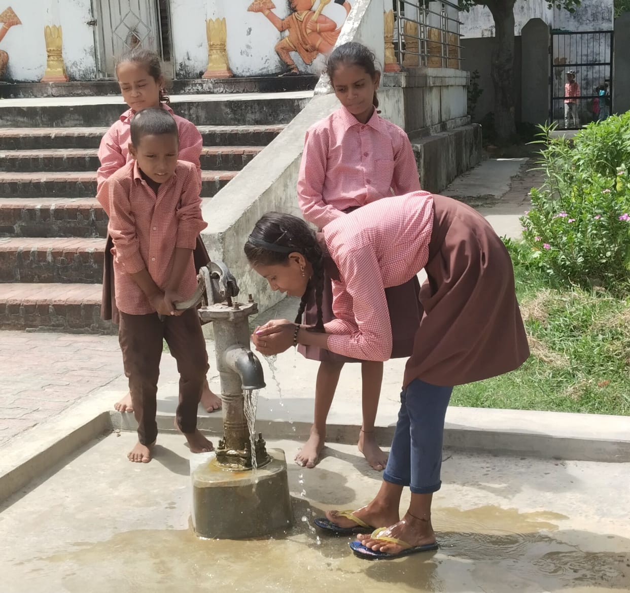 Children wander from house to house to quench their thirst