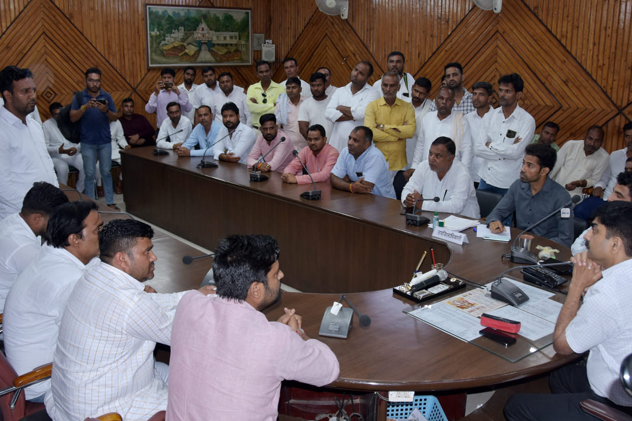 Angry over the registration of the case, the village head met the District Magistrate