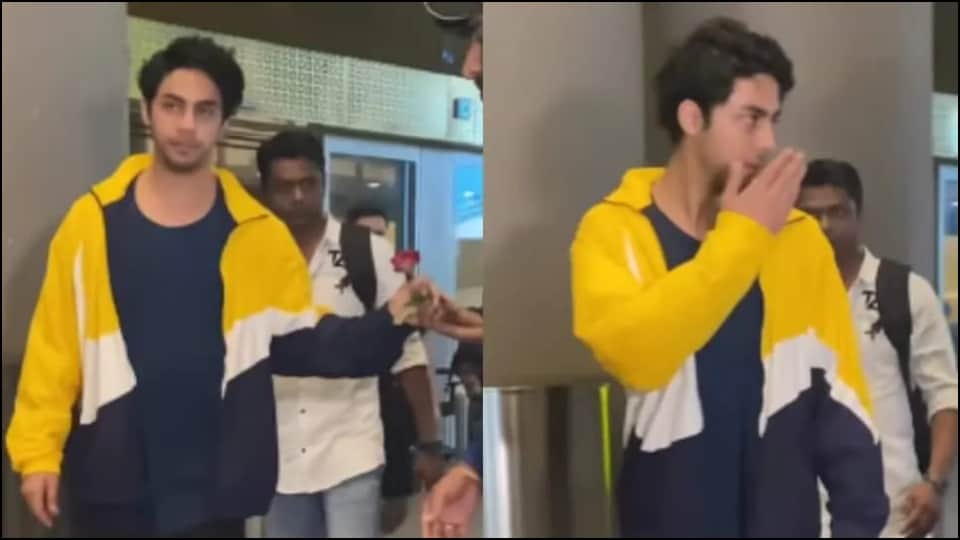 shahrukh khan son aryan received rose and hand kisses to fans at mumbai airport watch video