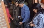 सत्तारपुर गांव में एंटी लार्वा दवा का छिड़काव करते स्वास्थ्यकर्मी ।
