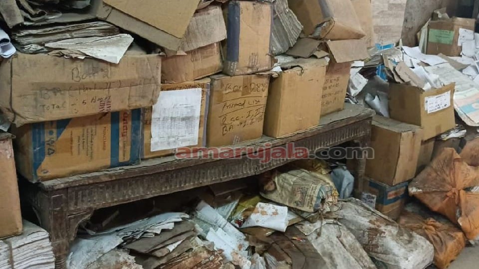Marksheets and degrees lying in the garbage of the examination department of Dr. Bhimrao Ambedkar University A