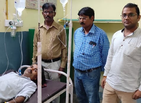 While opening the classroom door, the teacher got bitten by a snake.